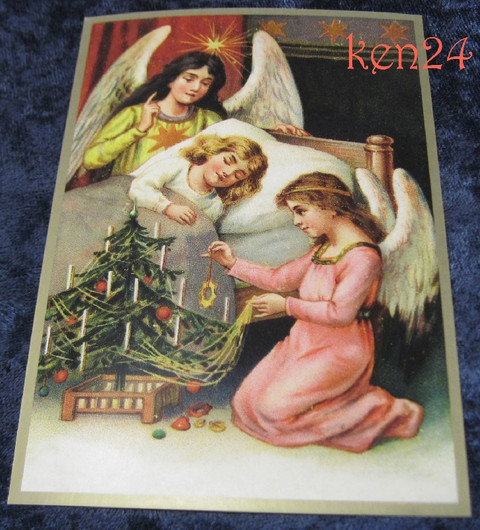 Joulukortti: 2 enkeliä ja joulukuusi vierellä, tyttö nukkumassa(ken24)