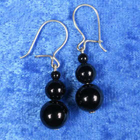 Korvakorut onyksi lumiukko 