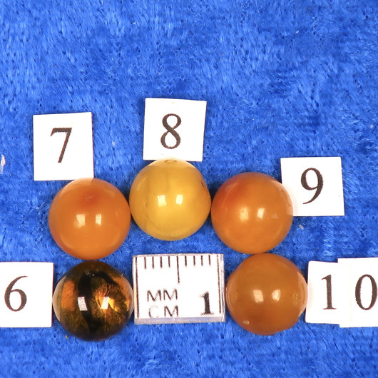 Kapussi meripihka 10mm pyöreä cabochon. Valitse valikosta