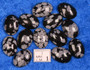 Kapussi lumihiutaleobsidiaani 9x13mm ovaali cabochon