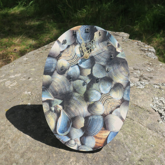 Seinäkello simpukat