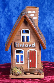 Keramiikkaa talo tuikkukynttilälle, teksti Finland