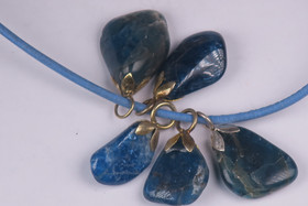 Riipus apatiitti rumpuhiottu onnenkivi