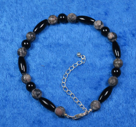 Rannekoru fossiilijaspis ja onyksi 19-24cm FOS74