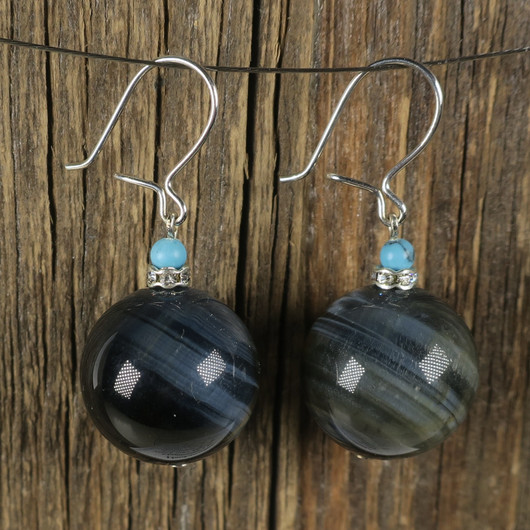 Korvakorut haukansilmä 16mm, magnesiitti zirkonikoristein, kookkaat