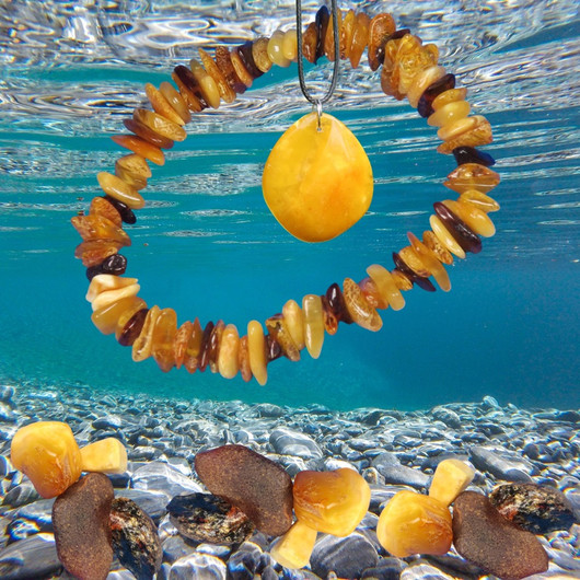 Riipus meripihka 40x35x11mm Amber1 