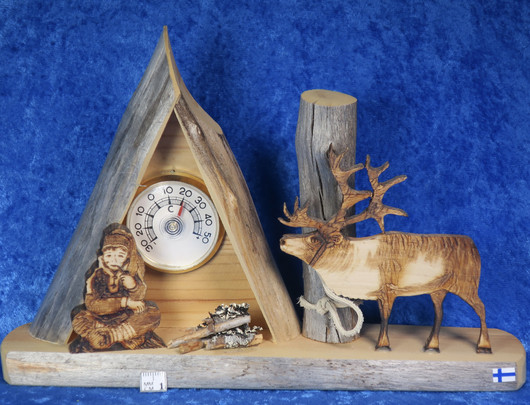 Lämpömittari kota, mies ja poro, kelopuuta