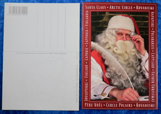 Postikortti joulupukki ja sulkakynä