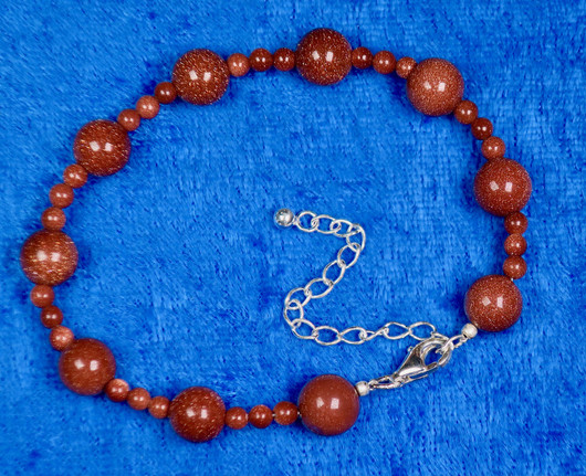 Rannekoru punaruskea aventuriini kultavirta 18-22cm. Star1