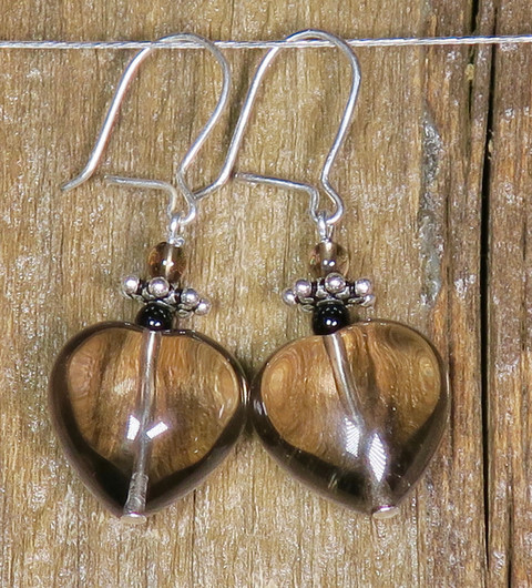 Korvakorut savukvartsisydän, onyx ja 925-hopeakukka E