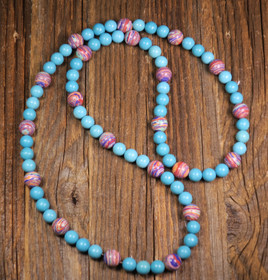 Helmet turkoosivärjätty magnesiitti ja raitakivi 70cm, nro raita2