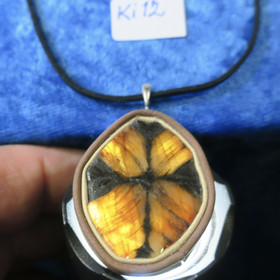 Riipus kiastoliitti nahkasomisteinen ristikivi  ki12