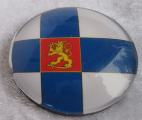 Magneetti Suomen lippu jossa Suomen leijona 