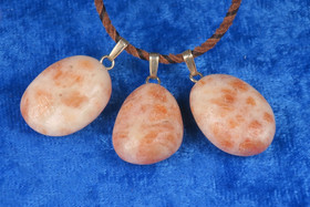 Riipus aurinkokivi rumpuhiottu