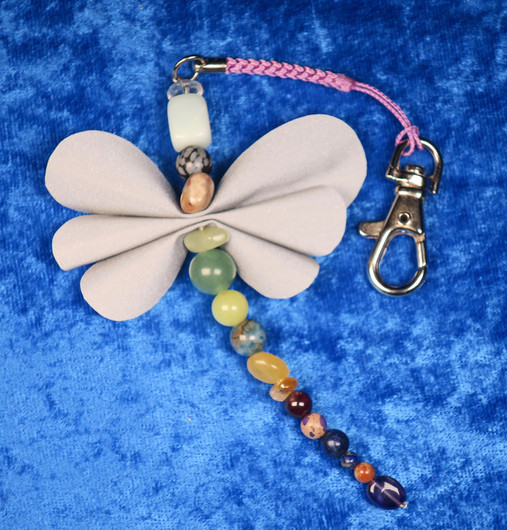 Heijastin perhonen NEITSYT VIRGO onnenkivillä, karbiinihaka 