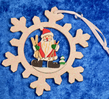 Joulukoriste joulupukki lumihiutaleessa, puuta