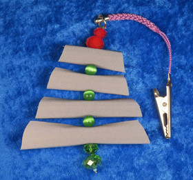 Heijastin joulukuusi, lasihelmet. Nipsulla. Reflector