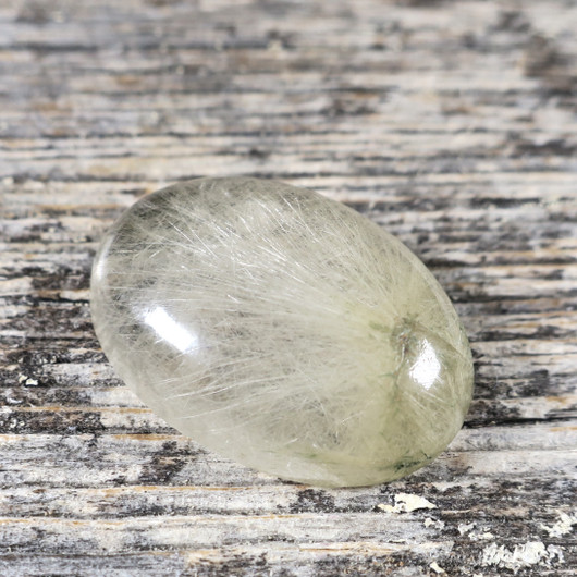 Kapussi rutiilikvartsi 18x25x8mm ovaali cabochon nro K