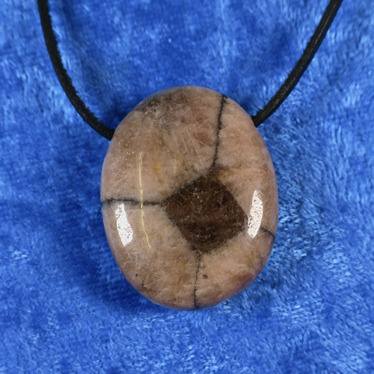 Riipus kiastoliitti ristikivi porattu Ki24