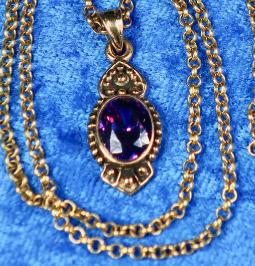 Pronssikorusetti SIRO zirkonilla tumma violetti riipus ja korvakorut 