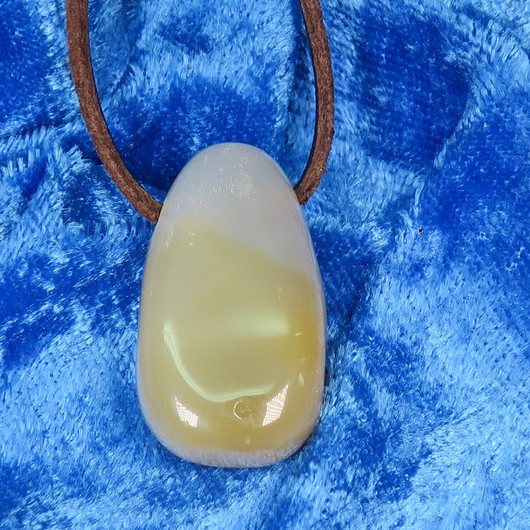 Riipus akaatti harmaanruskea porattu