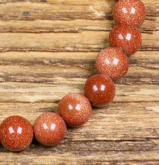 Aventuriini kultavirta punaruskea kimalteleva 8mm irtohelmi