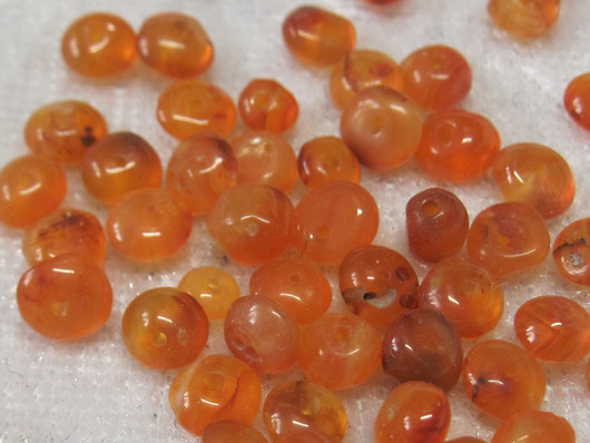 Karneoli 4x2mm oranssi litteä irtohelmi 