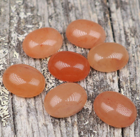 Kapussi karneoli vaalea oranssi 8x10mm ovaali cabochon