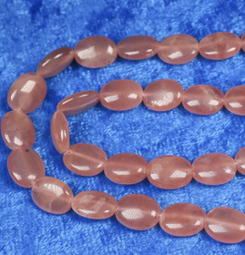 Rodokrosiitti litteä ovaali läpikuultava 9x7x3mm irtohelmi 