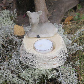 Tuikkualusta poro keramiikkaa