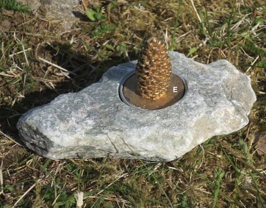 Tuikkualusta serpentiniitti valitse kuvista A, B,C, D,E,X