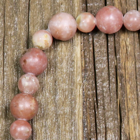 Kalkkikivi vaaleanpunainen  pyöreä 8mm irtohelmi