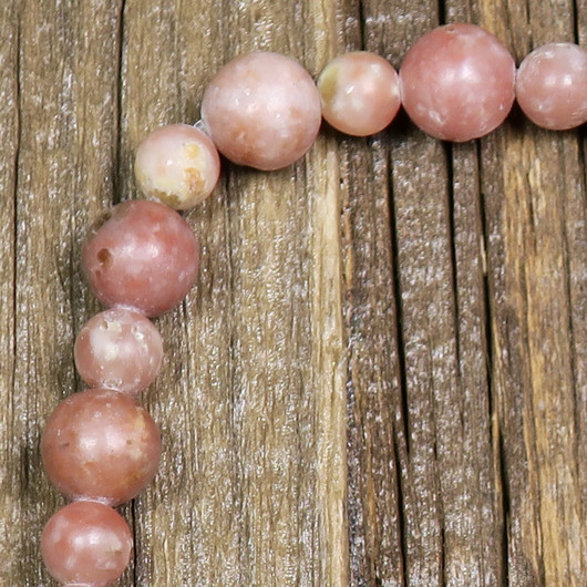 Kalkkikivi vaaleanpunainen  pyöreä 8mm irtohelmi