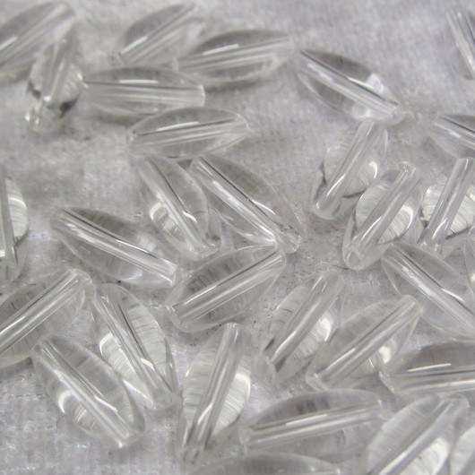Vuorikide kirkas n. 12x4mm riisin mallinen irtohelmi