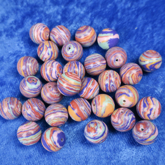 Kivihelmi 10mm violetti/oranssi/turkoosi  synteettinen irtohelmi