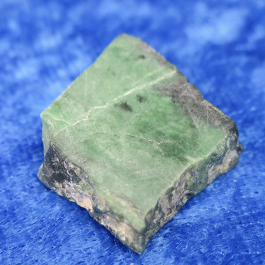 Kromidiopsidi 5g siivu 20x18x6mm, yksi puoli hiottu Hi52