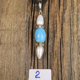 Riipus helmi ja turkoosivärjätty magnesiitti zirkonikoristein RAIJA