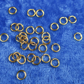 Liitosrengas avolenkki 5mm kullanvärinen korutarvike. Myyntierä 10 kpl