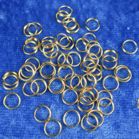 Tuplarengas 5mm kullanvärinen korutarvike. 