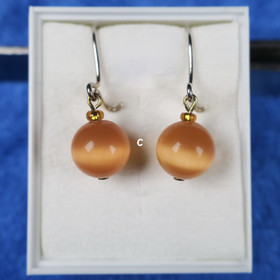 Korvakorut kissansilmälasi 8mm oranssi