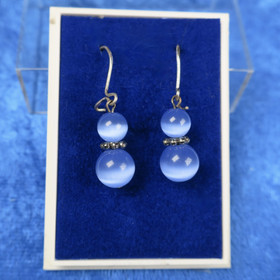 Korvakorut vaaleansininen kissansilmälasi 8k6