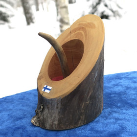 Sormusteline poronsarvi ja kelopuuta