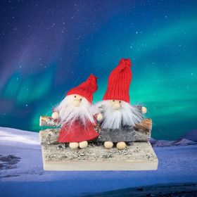 Joulukoriste 2 tonttua kelopuulla nojaavat kelopuihin