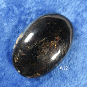 Kapussi astrofylliitti 35x23mm 7mm ovaali  A12