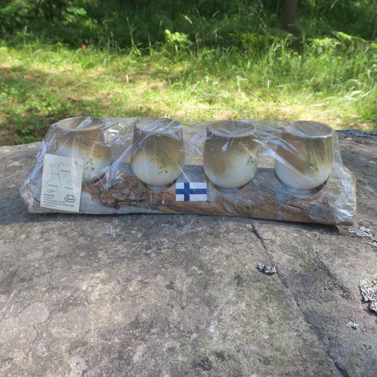 Hömpsypölkky setissä 4 keramiikkapikaria, 40cm kelopuutelineessä M