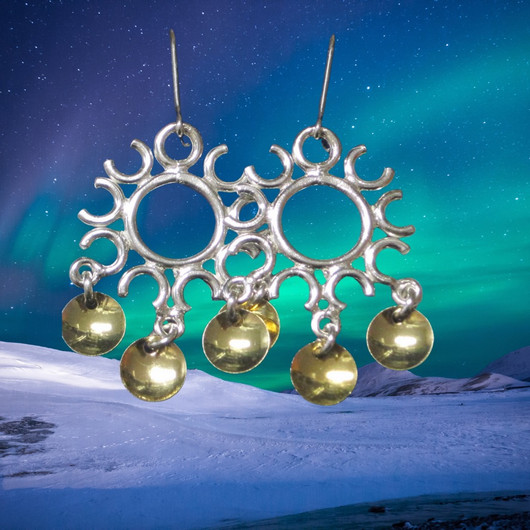 Korvakorut aurinko, hopeaa, kullatut laukkaset