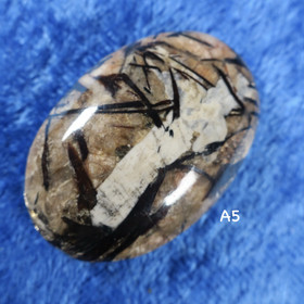 Kapussi astrofylliitti  36x25mm 8mm ovaali A5