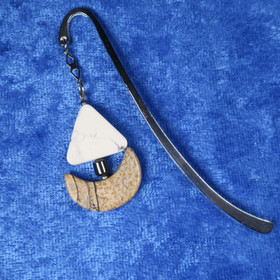 Kirjanmerkki maisemajaspis purjevene