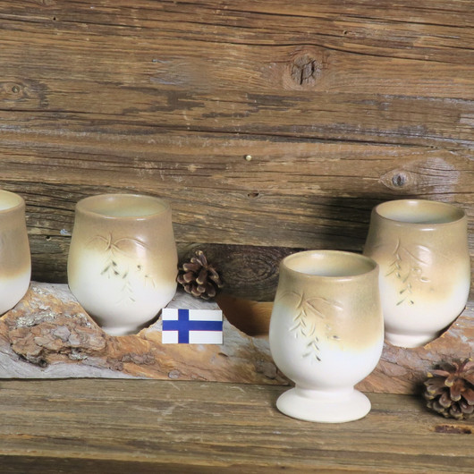 Hömpsypölkky setissä 4 keramiikkapikaria, 40cm kelopuutelineessä M