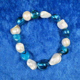 Rannekoru simpukka ja makeanveden helmi